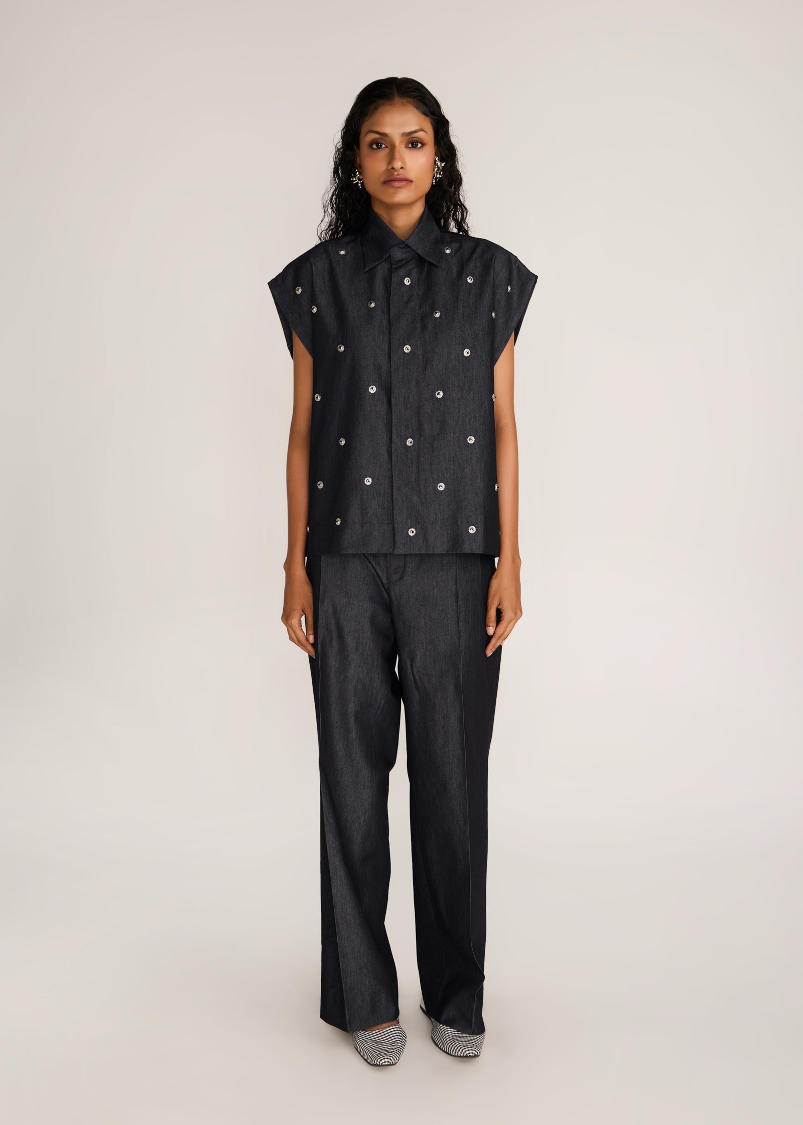 ROSANI The Converis shirt in charcoal - charcoal denim sleeveless shirt with metal flower embroidery, front view