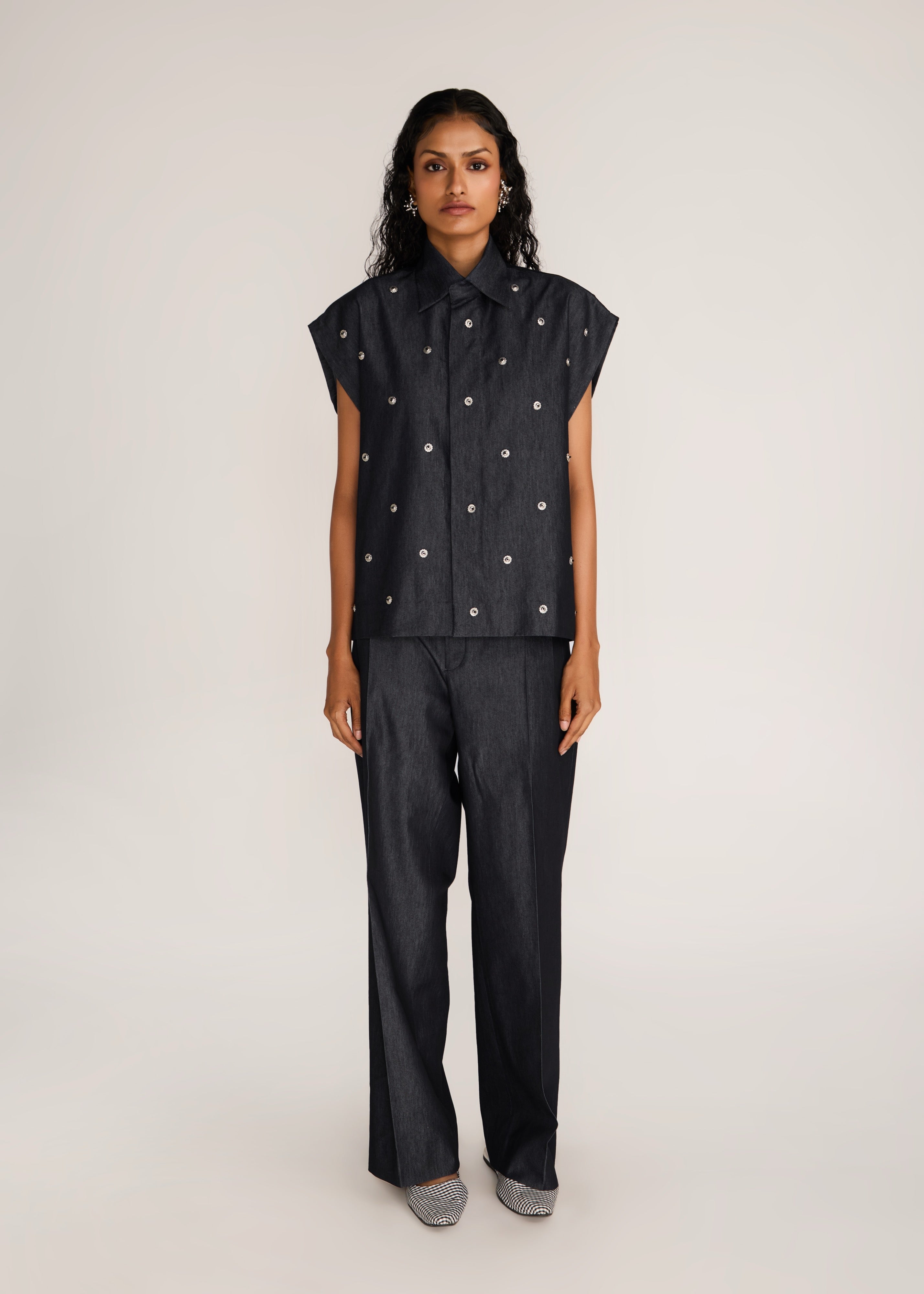 ROSANI The Converis shirt in charcoal - charcoal denim sleeveless shirt with metal flower embroidery, front view