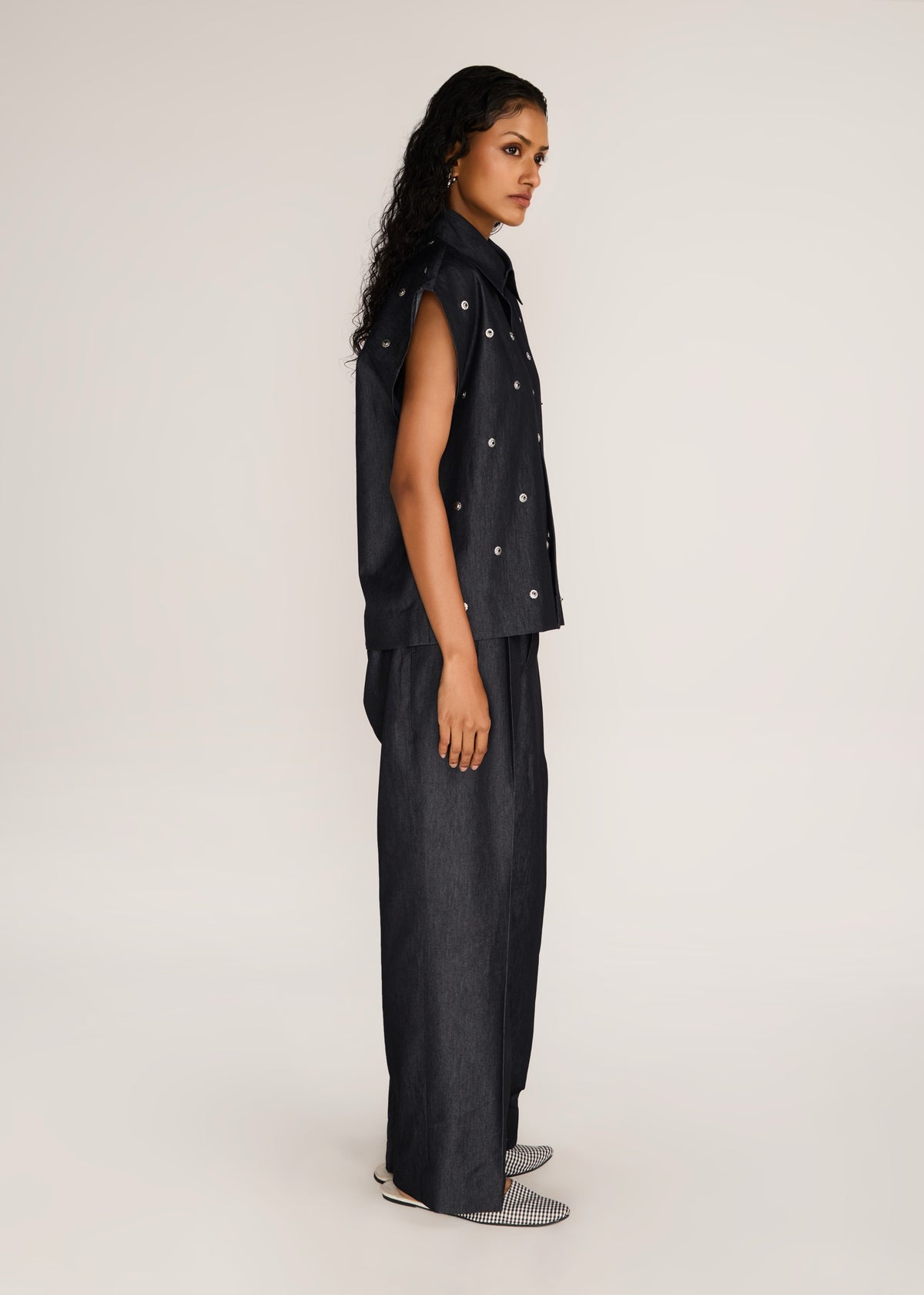 ROSANI The Converis shirt in charcoal - charcoal denim sleeveless shirt with metal flower embroidery, side view