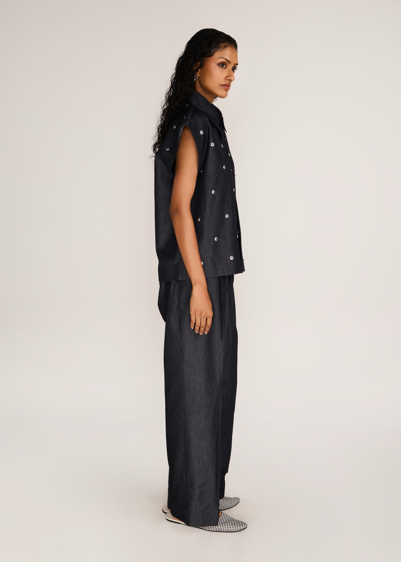 ROSANI The Converis shirt in charcoal - charcoal denim sleeveless shirt with metal flower embroidery, side view