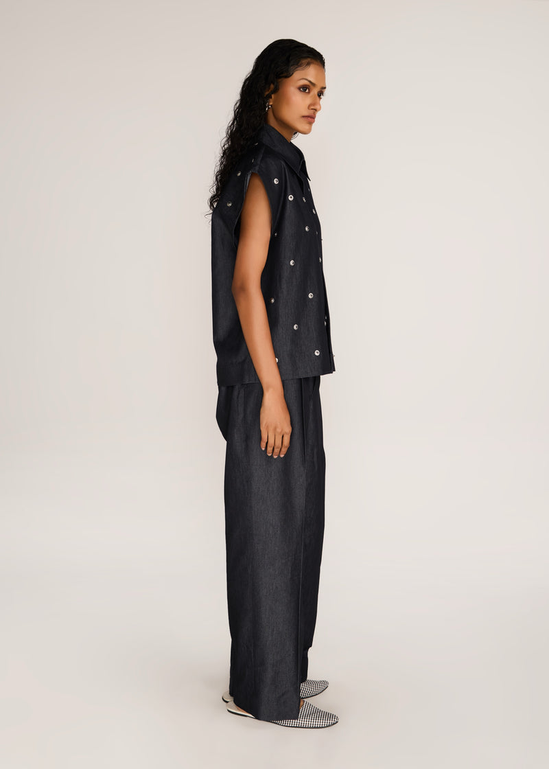 ROSANI The Converis shirt in charcoal - charcoal denim sleeveless shirt with metal flower embroidery, side view