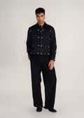 ROSANI The Einklang jacket in black denim - black denim embroidered shacket with tonal threadwork, front view