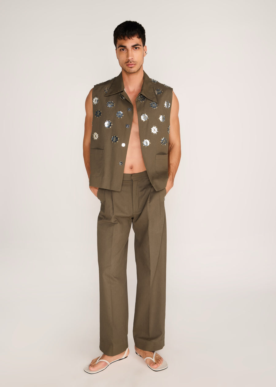 ROSANI The Encuentro vest in deep olive - deep olive utility vest with hand-embroidered silver discs, front view