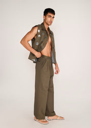 ROSANI The Encuentro vest in deep olive - deep olive utility vest with hand-embroidered silver discs, side view, alternate angle
