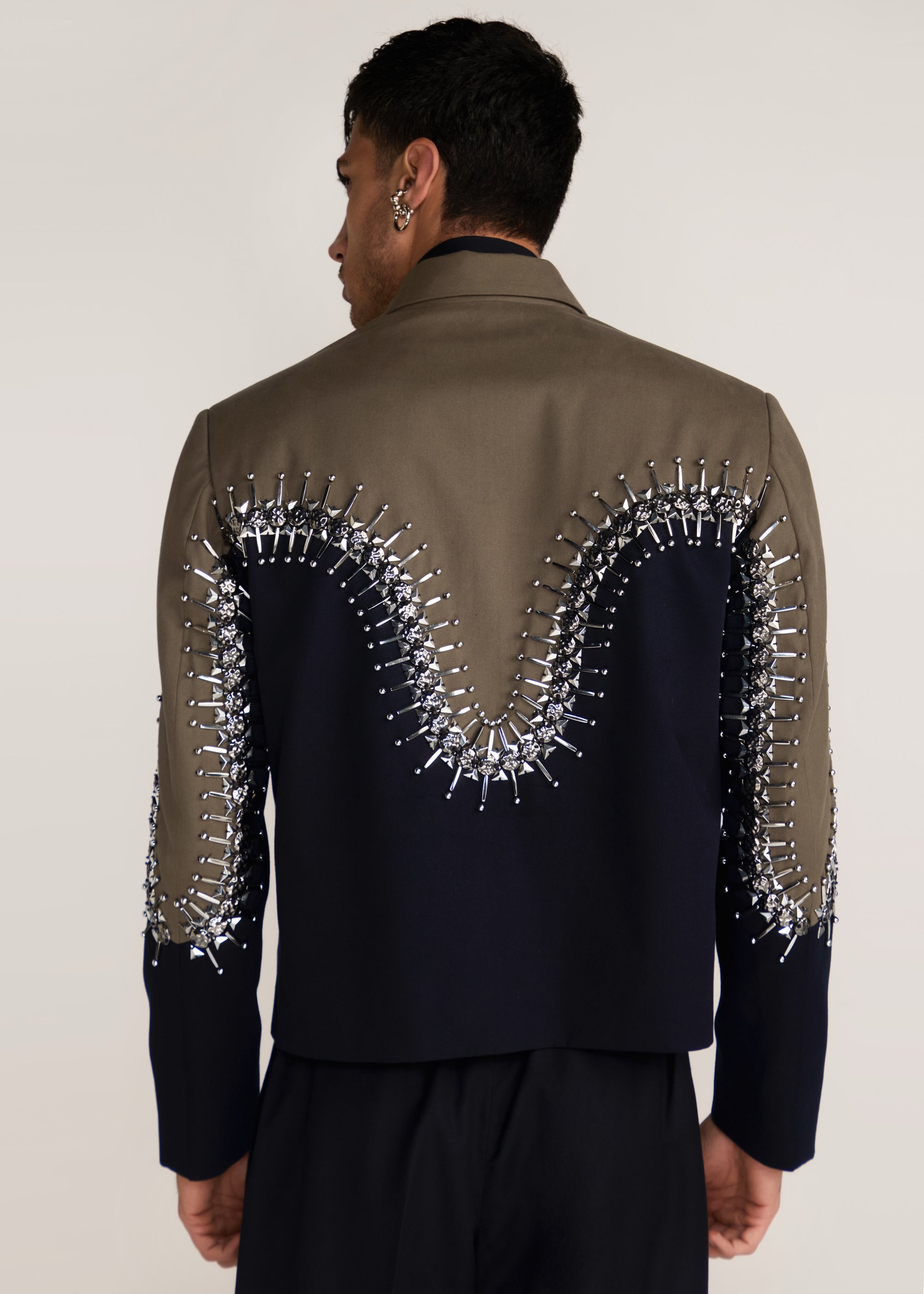 ROSANI The Förening jacket in deep olive & black - deep olive and black hand-embroidered patched jacket, back view