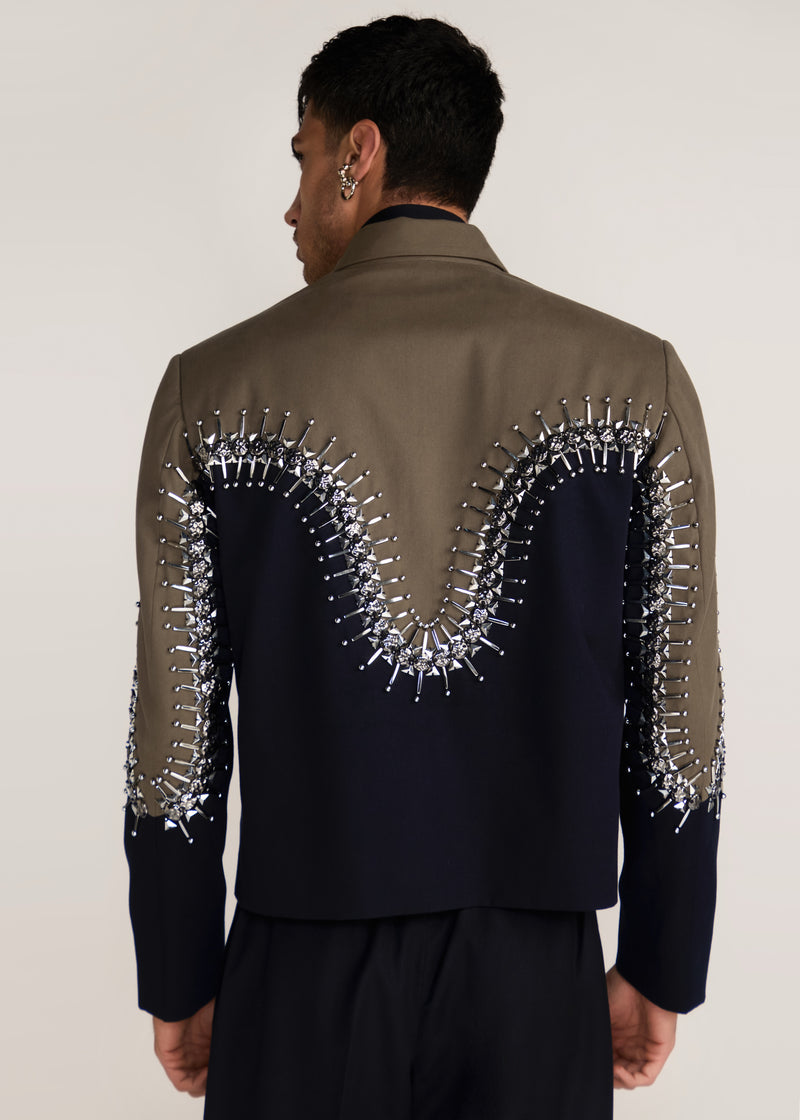 ROSANI The Förening jacket in deep olive & black - deep olive and black hand-embroidered patched jacket, back view