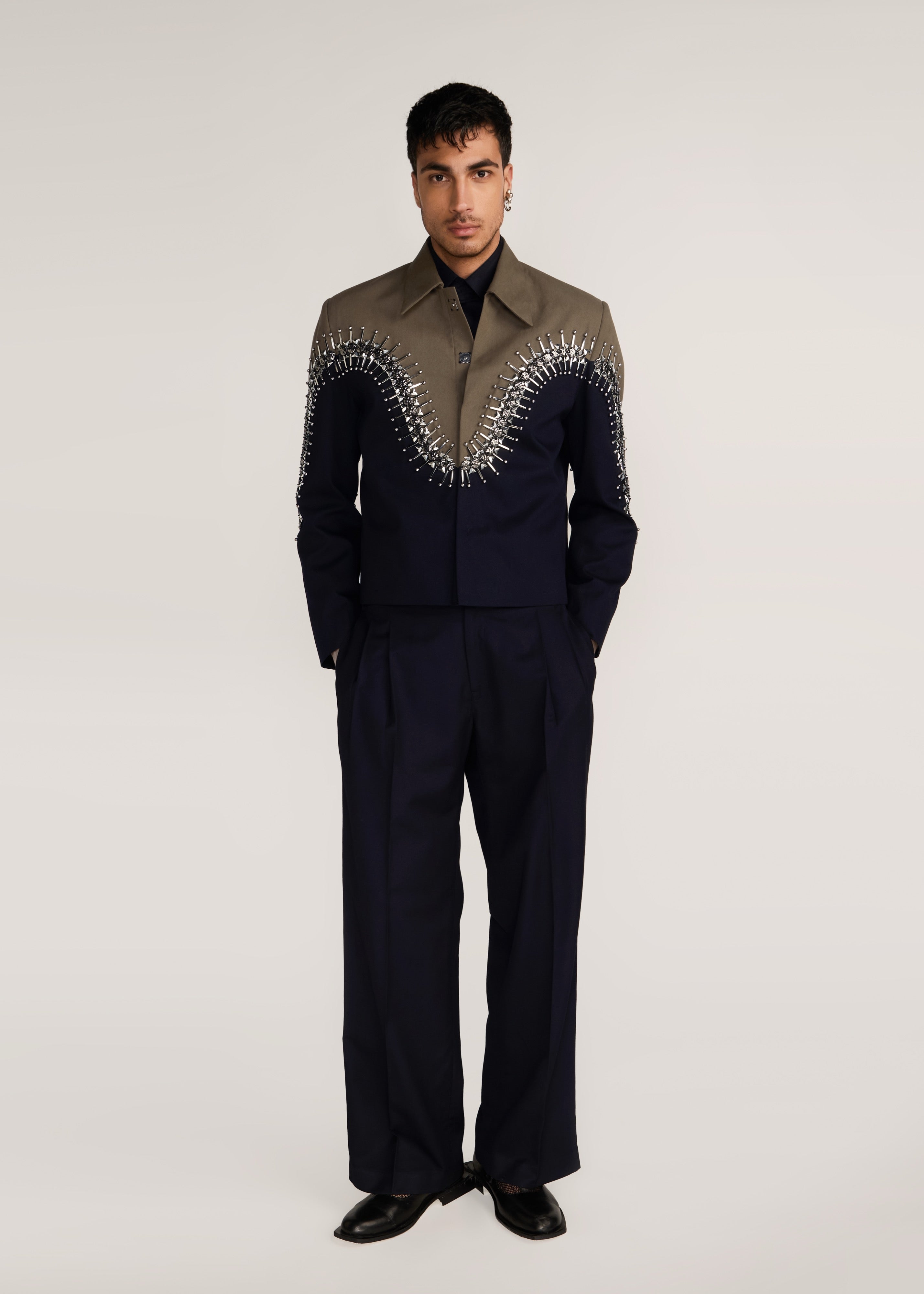 ROSANI The Förening jacket in deep olive & black - deep olive and black hand-embroidered patched jacket, front view