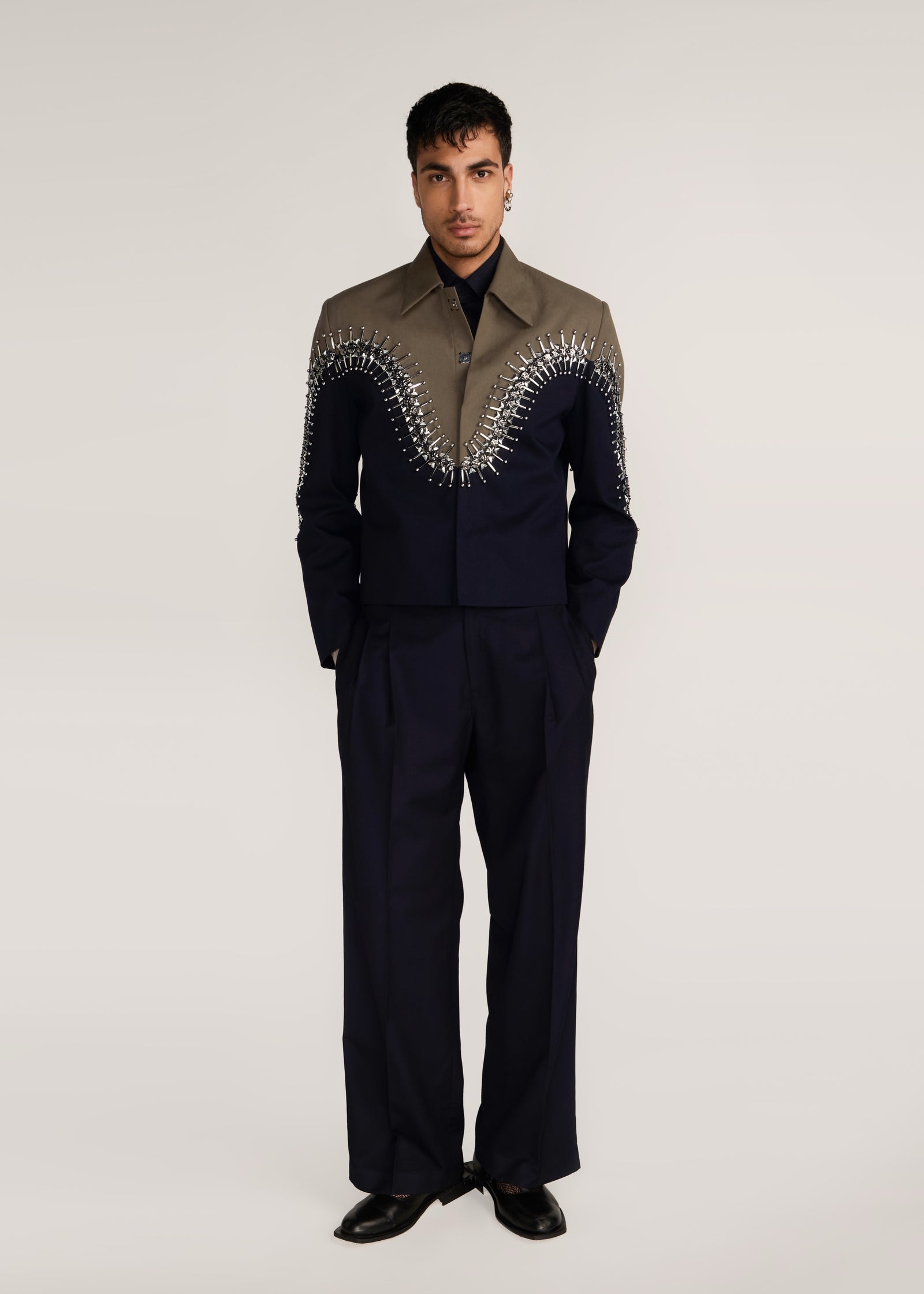 ROSANI The Förening jacket in deep olive & black - deep olive and black hand-embroidered patched jacket, front view