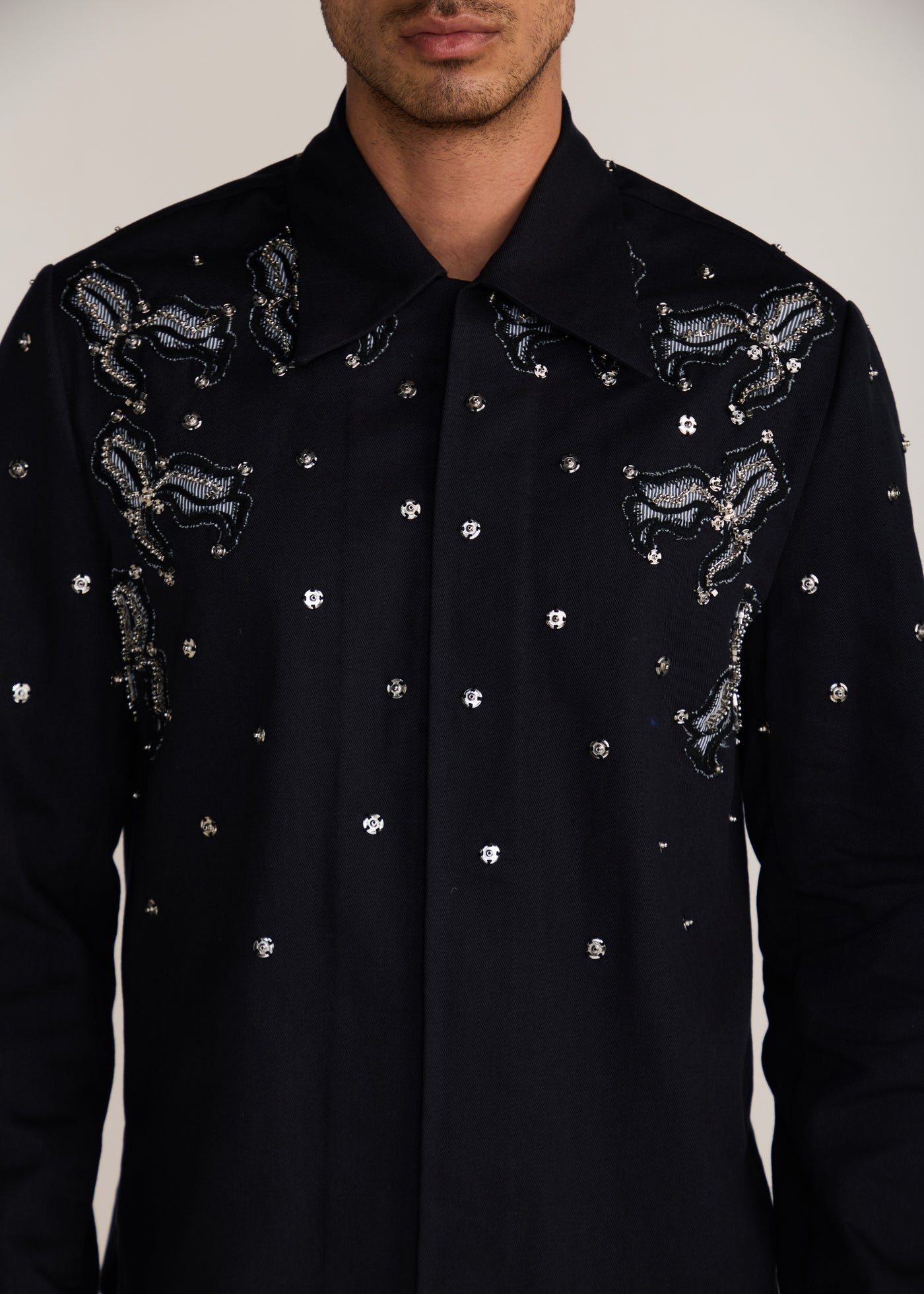 ROSANI The Henosis jacket in black denim - black denim patchwork shacket with metallic snap buttons, craft detail