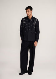 ROSANI The Henosis jacket in black denim - black denim patchwork shacket with metallic snap buttons, front view