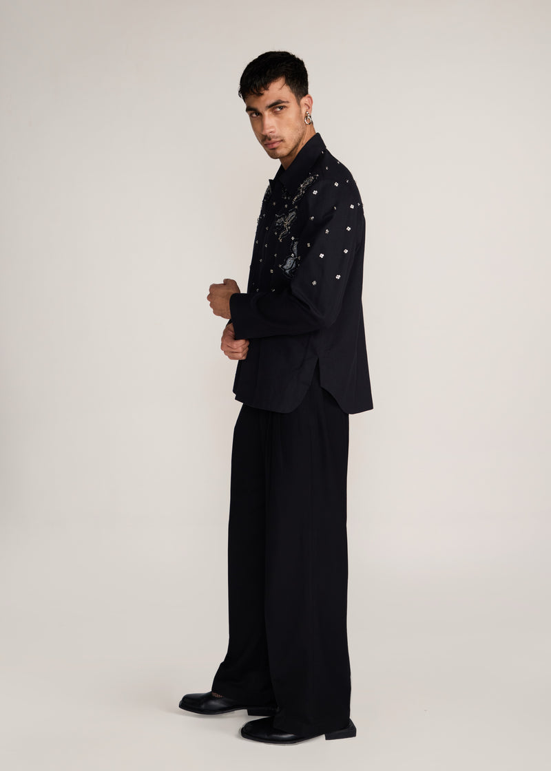 ROSANI The Henosis jacket in black denim - black denim patchwork shacket with metallic snap buttons, side view