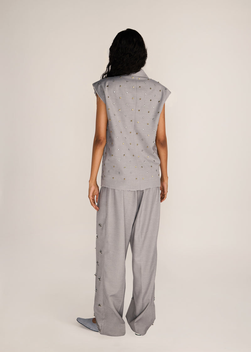 ROSANI The Ilchi trouser in steel - steel fluid suiting trouser with metal botanical accents, back view