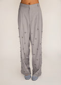 ROSANI The Ilchi trouser in steel - steel fluid suiting trouser with metal botanical accents, front view
