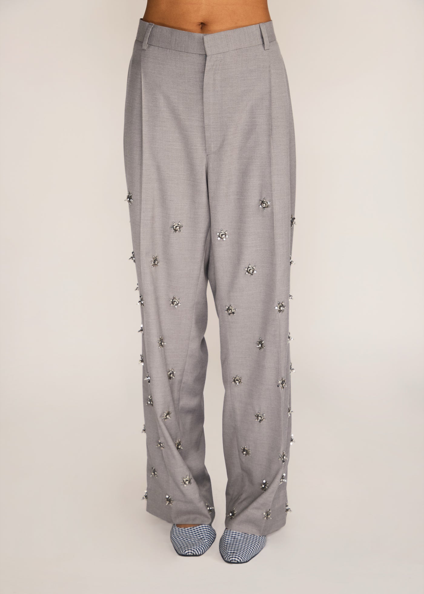 ROSANI The Ilchi trouser in steel - steel fluid suiting trouser with metal botanical accents, front view
