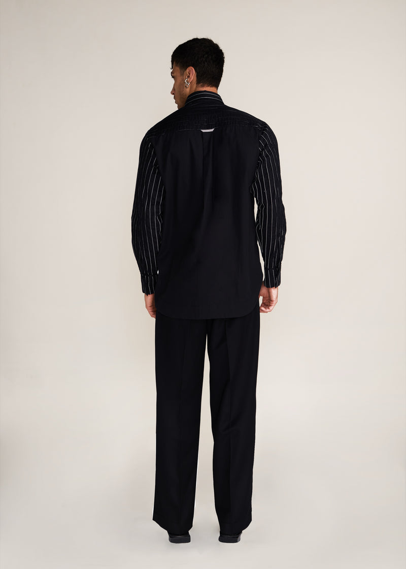 ROSANI The Kisuna shirt in black - black striped shirt with hand-embroidered raw-edge petals, back view