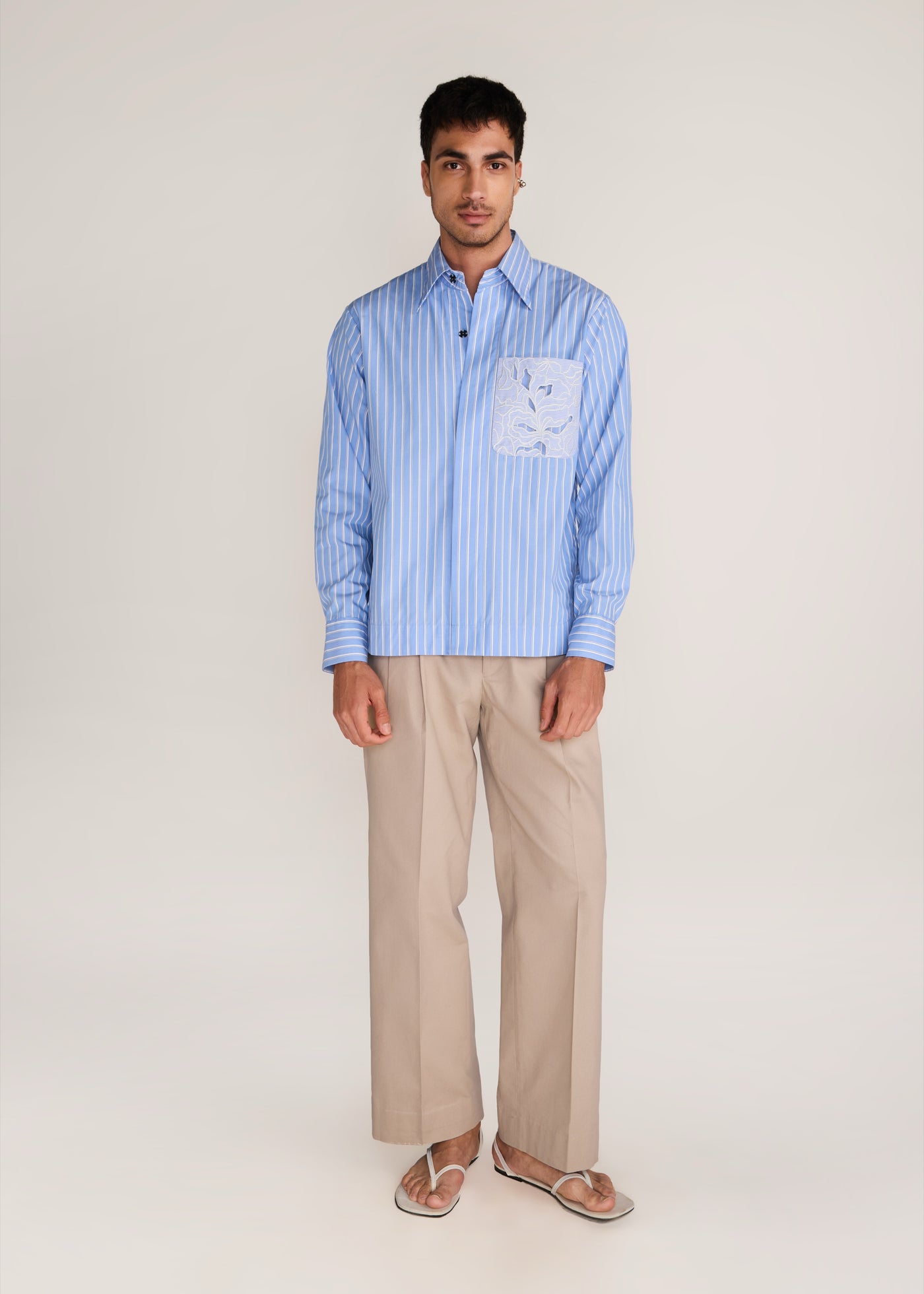 ROSANI The Mannam shirt in dreamy blue - dreamy blue striped shirt with cutwork flower panels, front view