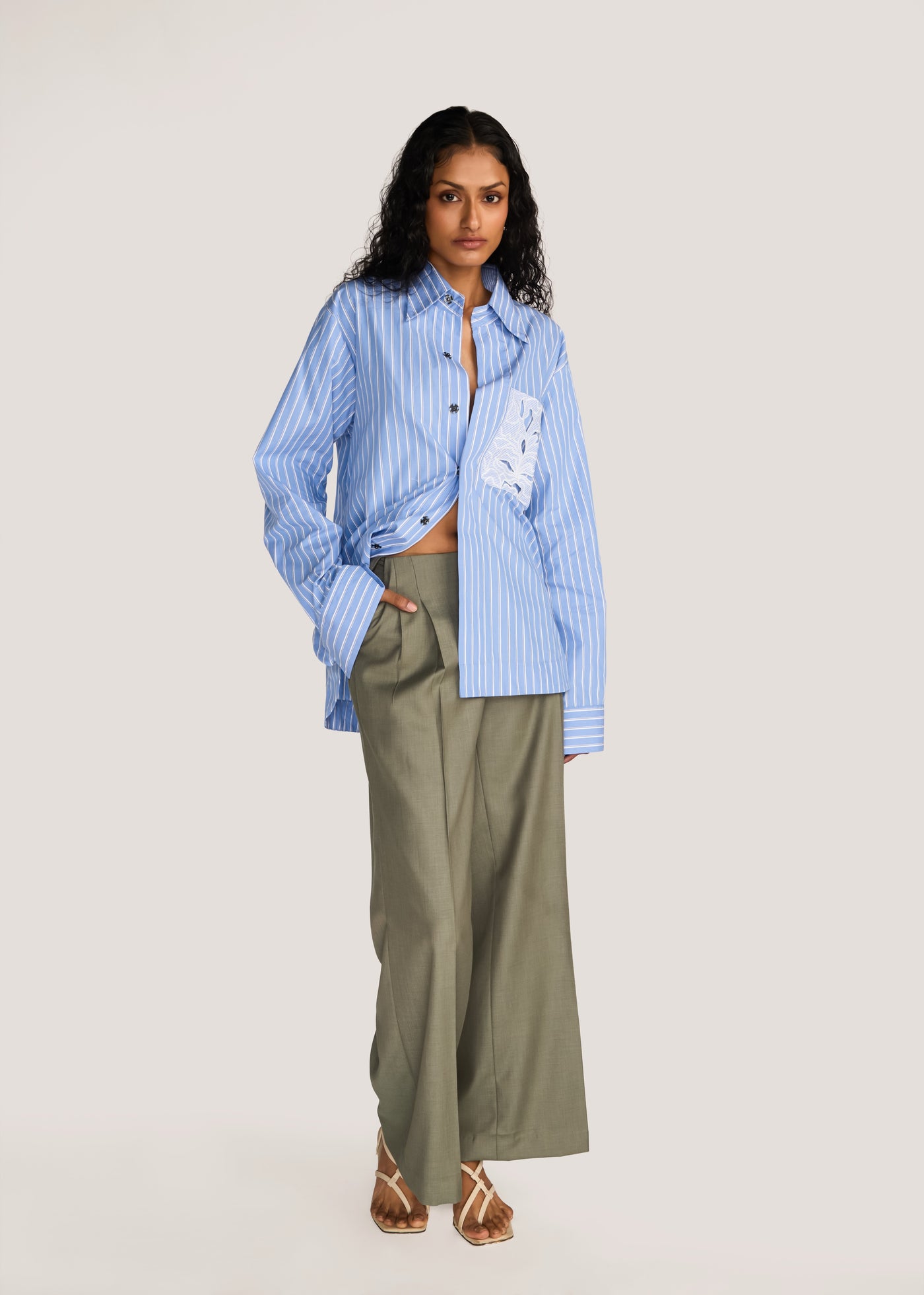 ROSANI The Mannam shirt in dreamy blue - dreamy blue striped shirt with cutwork flower panels, front view