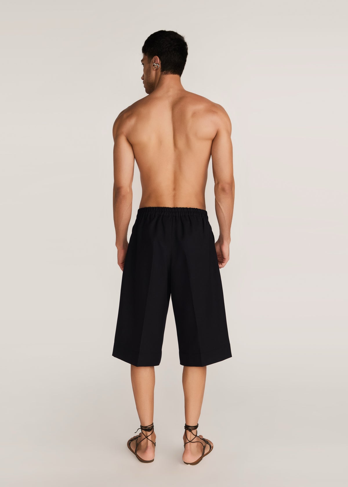 ROSANI The Nerza shorts in obsidian - obsidian suiting culotte shorts, back view
