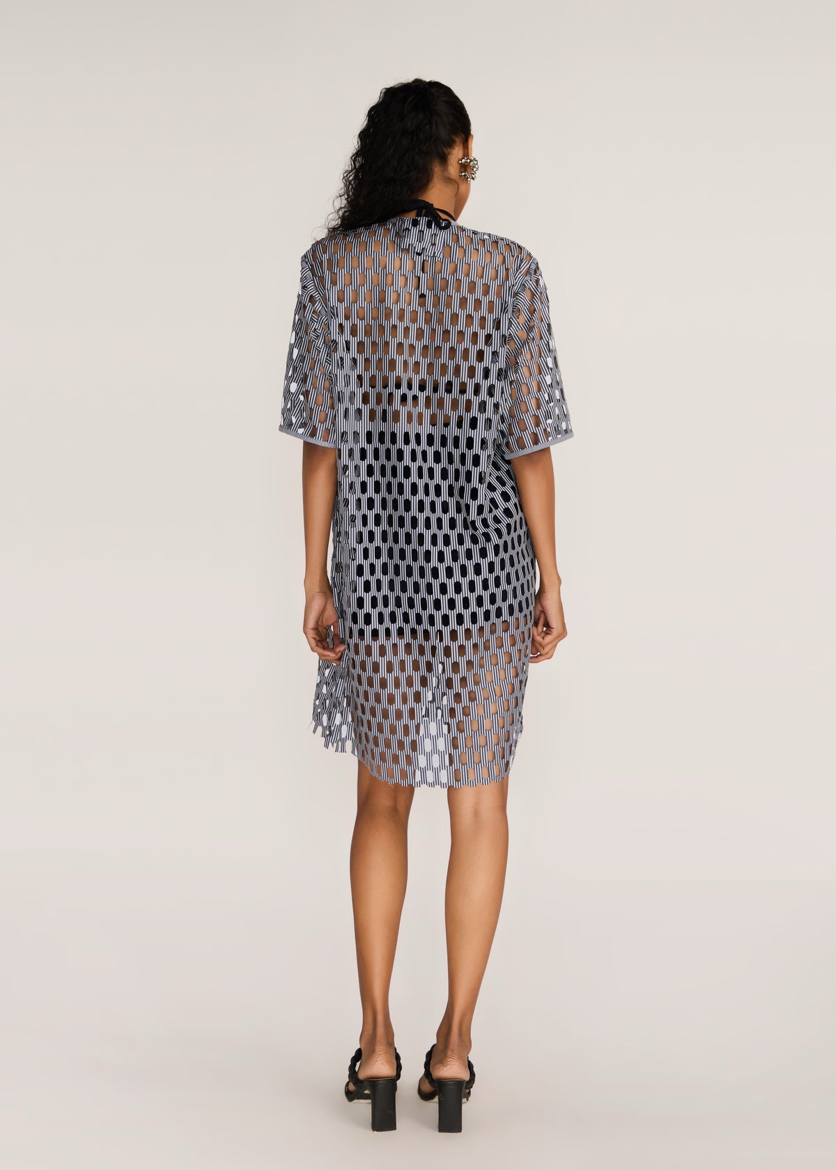 ROSANI The Nube dress in grey stripes - grey striped laser-cut dress with hand-embroidered placket, back view