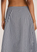ROSANI The Onda skirt in grey stripes - grey striped wave-inspired overlay skirt with belt detail, back view