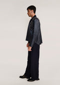 ROSANI The Samklang jacket in obsidian - obsidian leather jacket with hand-crocheted botanical shoulders, side view