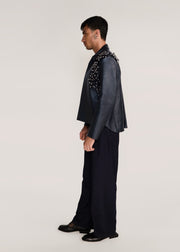ROSANI The Samklang jacket in obsidian - obsidian leather jacket with hand-crocheted botanical shoulders, side view