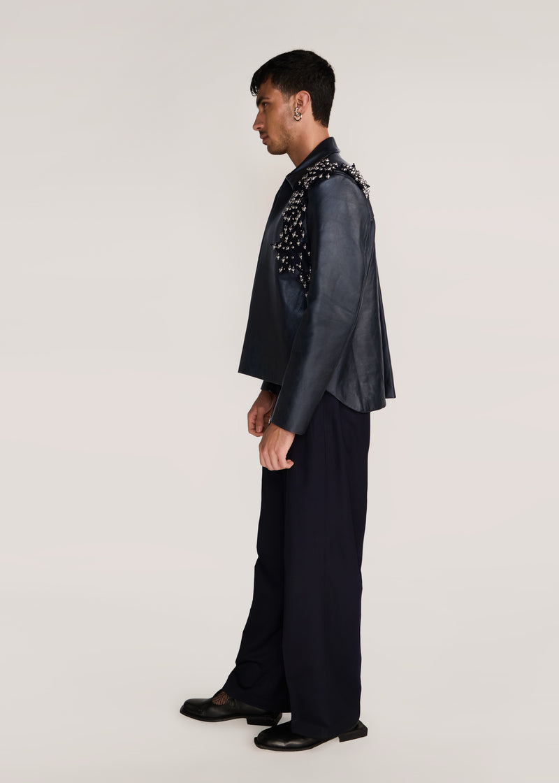 ROSANI The Samklang jacket in obsidian - obsidian leather jacket with hand-crocheted botanical shoulders, side view