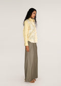 ROSANI The Synodos shirt in pale lemon - pale lemon cotton shirt with oversized sequin embroidery, side view