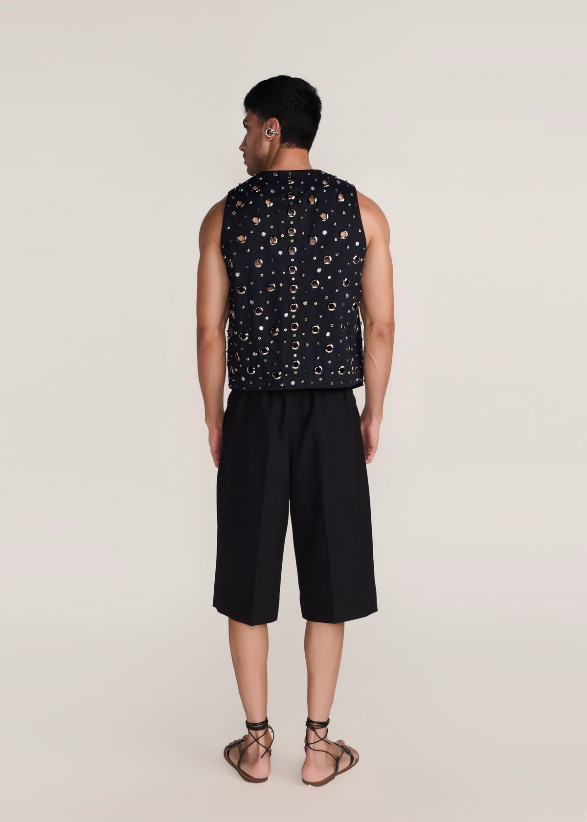 ROSANI The Synra vest in black denim - black denim eyelet and button embroidered vest, back view