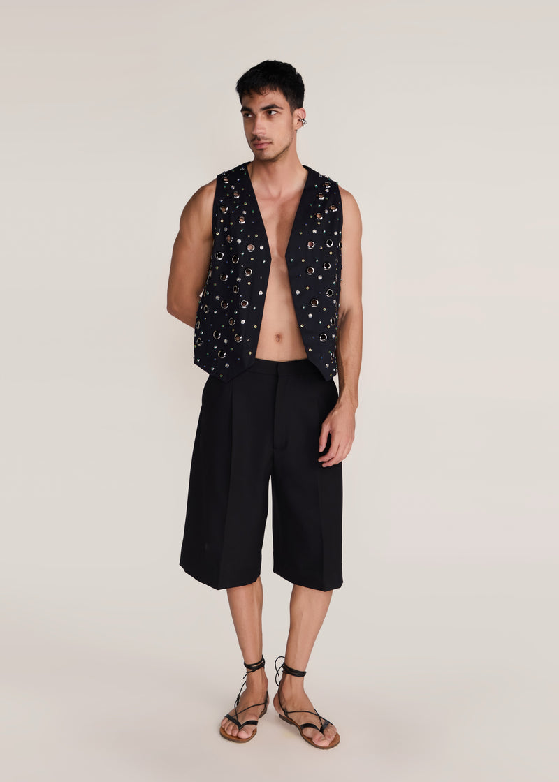 ROSANI The Synra vest in black denim - black denim eyelet and button embroidered vest, front view