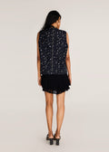 ROSANI The Synra vest in black denim - black denim eyelet and button embroidered vest, back view