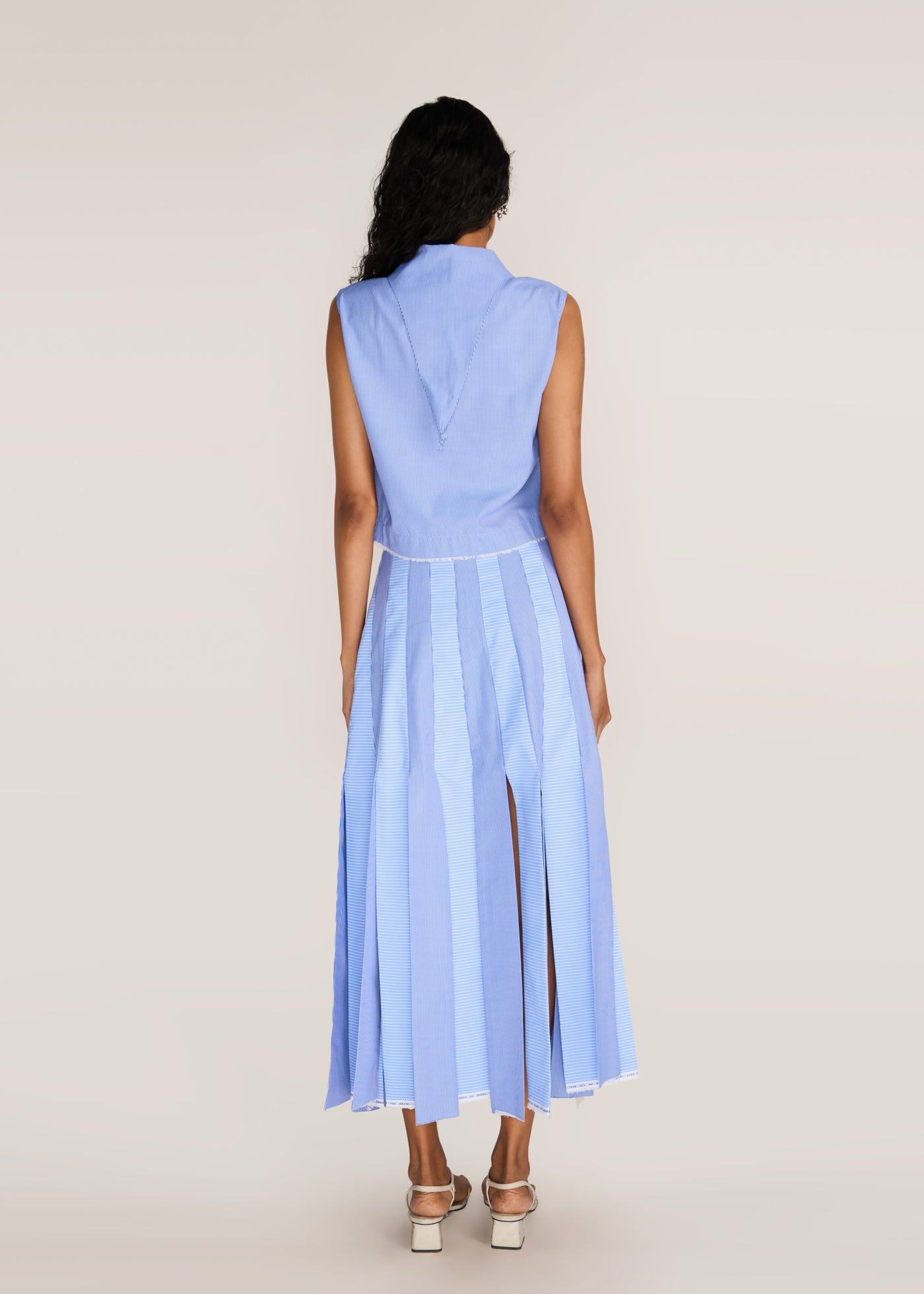 ROSANI The Synthesis top in dreamy blue - dreamy blue striped cropped top with knotted bandana-collar points, back view, alternate angle