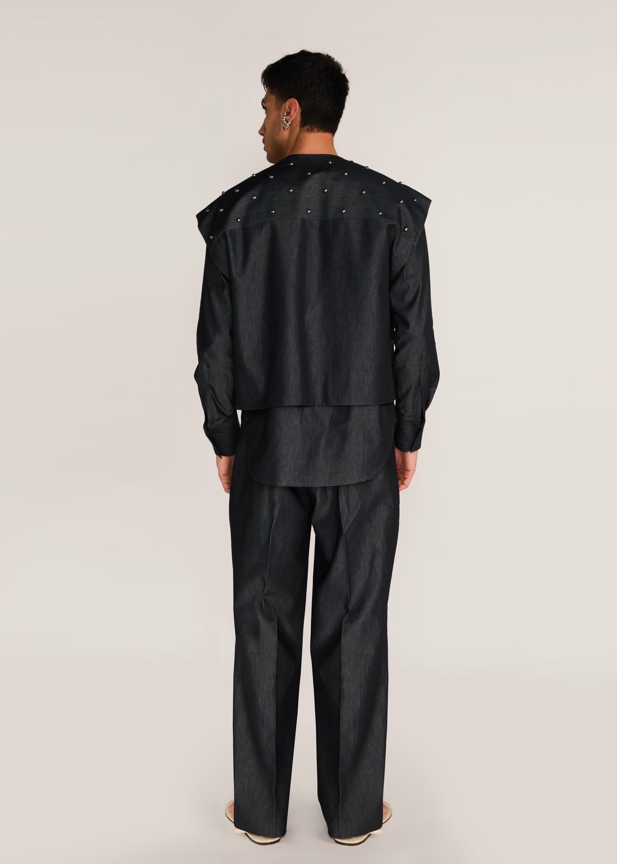 ROSANI The Tawāfuq vest in charcoal - charcoal metallic-detail suiting vest, back view