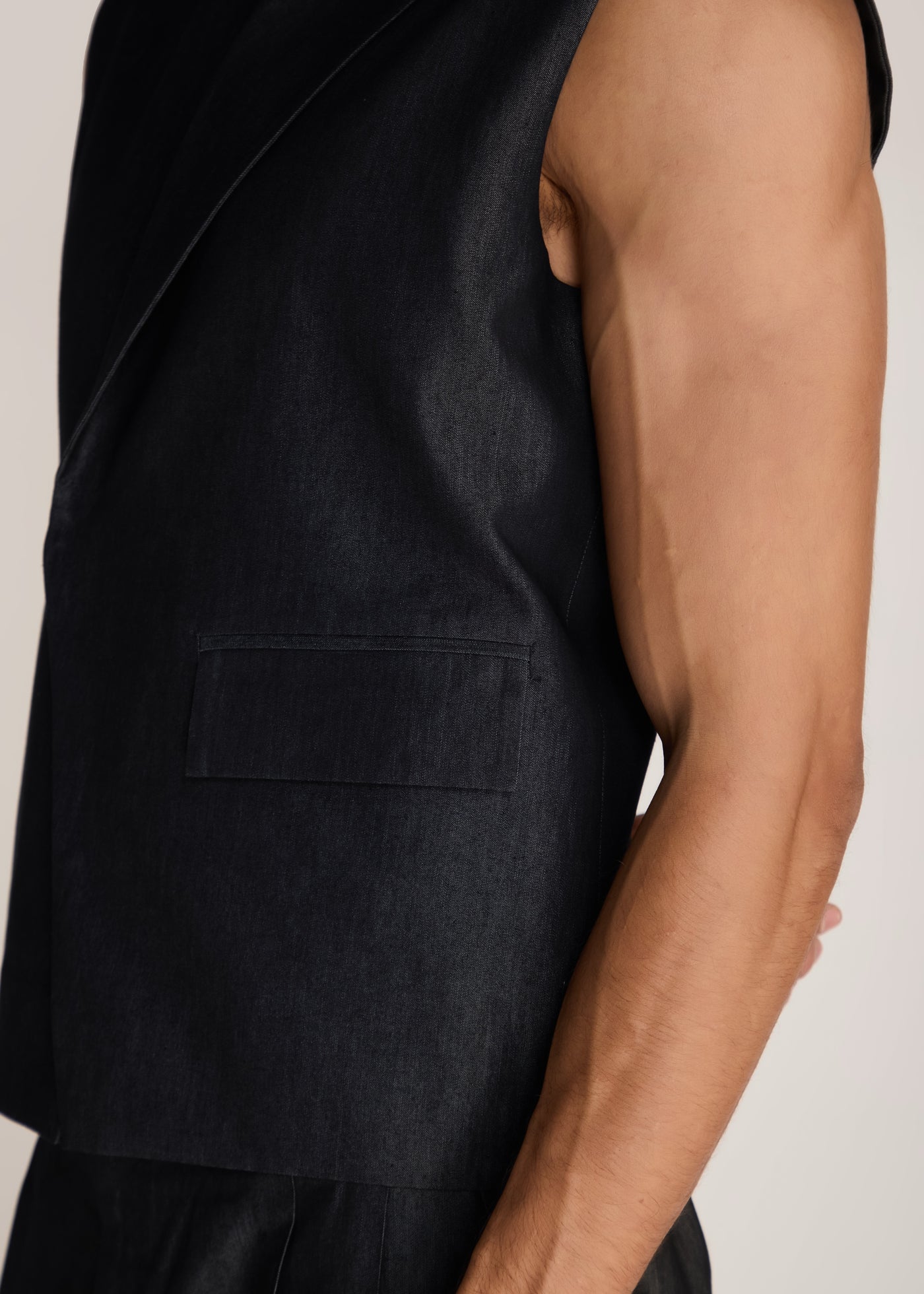 ROSANI The Ubuntu vest in charcoal - charcoal denim vest with asymmetric collar and placket, craft detail