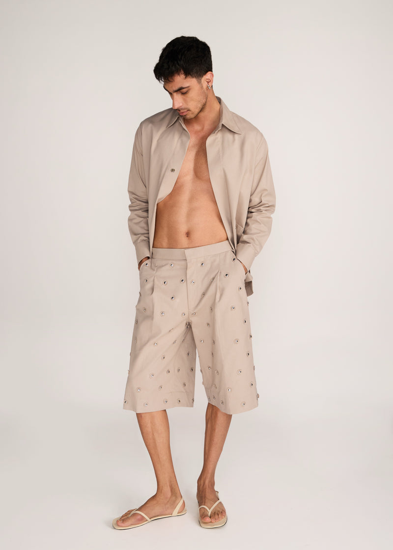 ROSANI The Unio shorts in sand dune - sand dune cotton laser-cut chrome embroidered shorts, front view, alternate angle