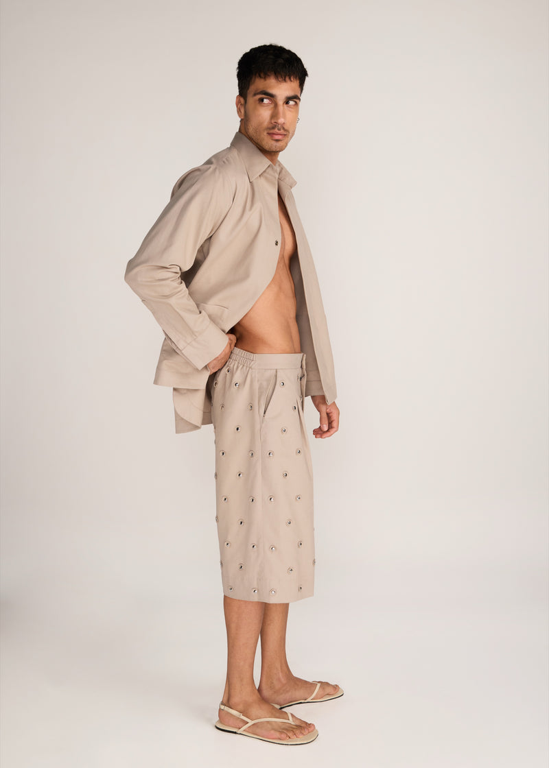 ROSANI The Unio shorts in sand dune - sand dune cotton laser-cut chrome embroidered shorts, side view