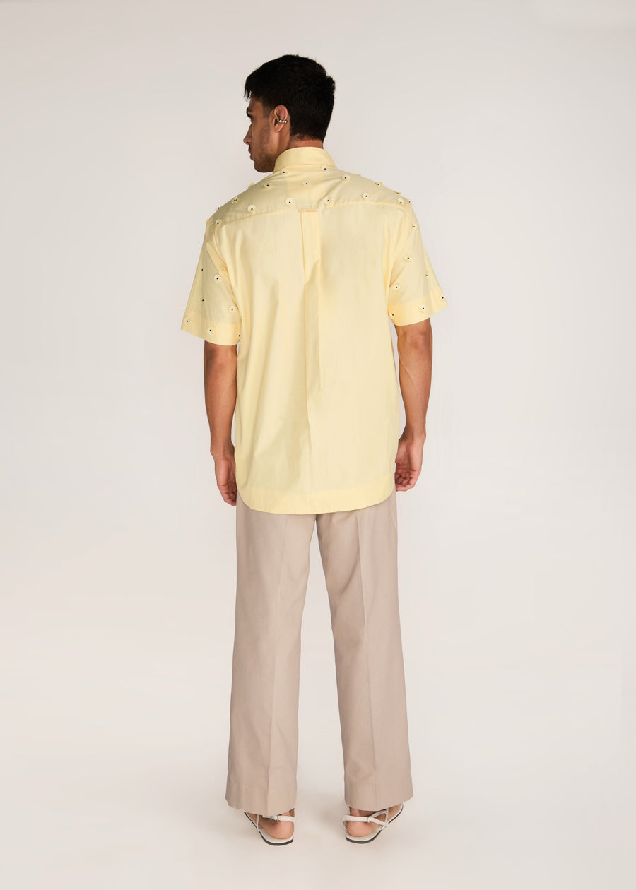 ROSANI The Yūgō shirt in pale lemon - pale lemon laser-cut shirt with hand-stitched black knots, back view