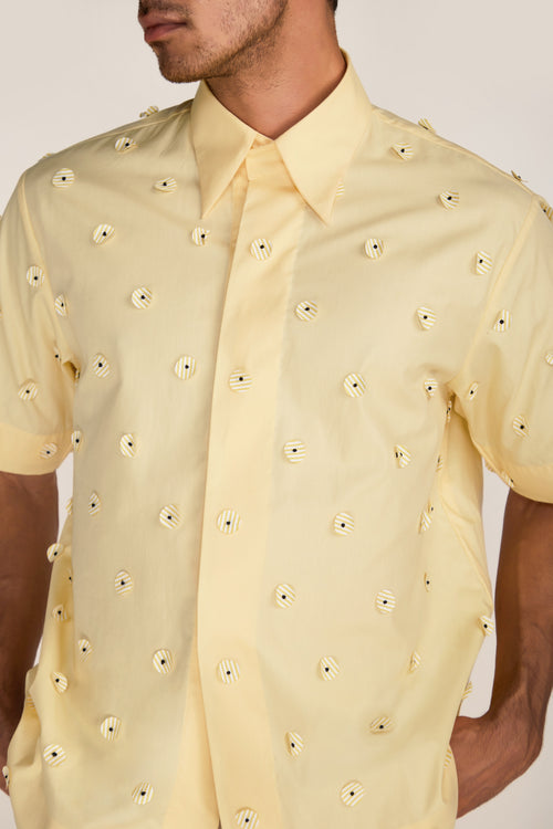 ROSANI The Yūgō shirt in pale lemon - pale lemon laser-cut shirt with hand-stitched black knots, craft detail
