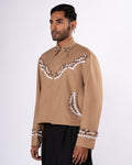 ROSANI The Darby jacket in khaki. Relaxed cowboy-inspired jacket with acrylic floral embellishment and magnetic button closure. ANIMA and ANIMUS collection, front view.
