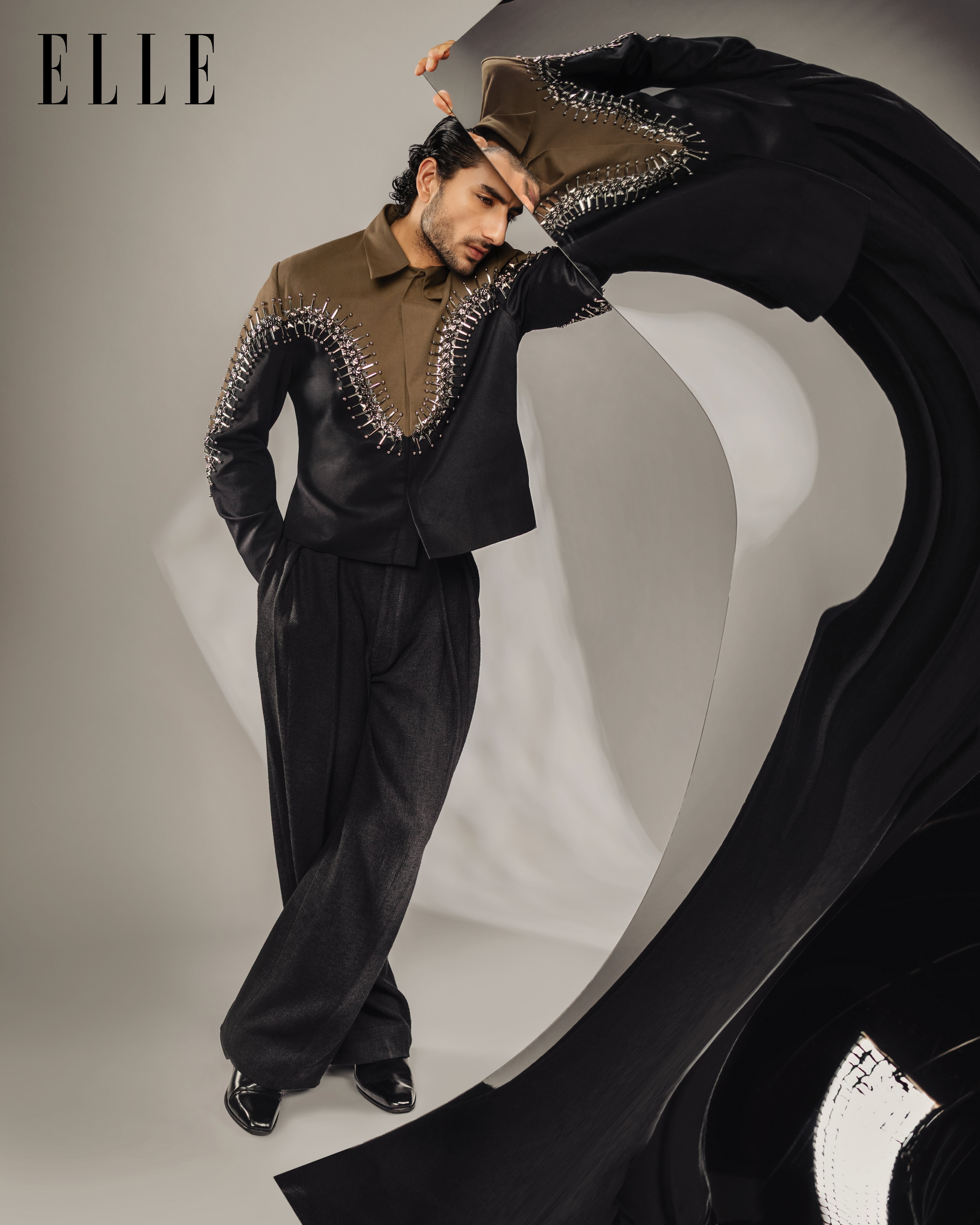 Ibrahim Ali Khan in the ROSANI Förening jacket, deep olive and black with metallic embroidery, worn with the Arantza trouser, ELLE India 2026