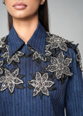 ROSANI The Lero jacket in midnight denim - metallic floral patch embellishment detail, close-up