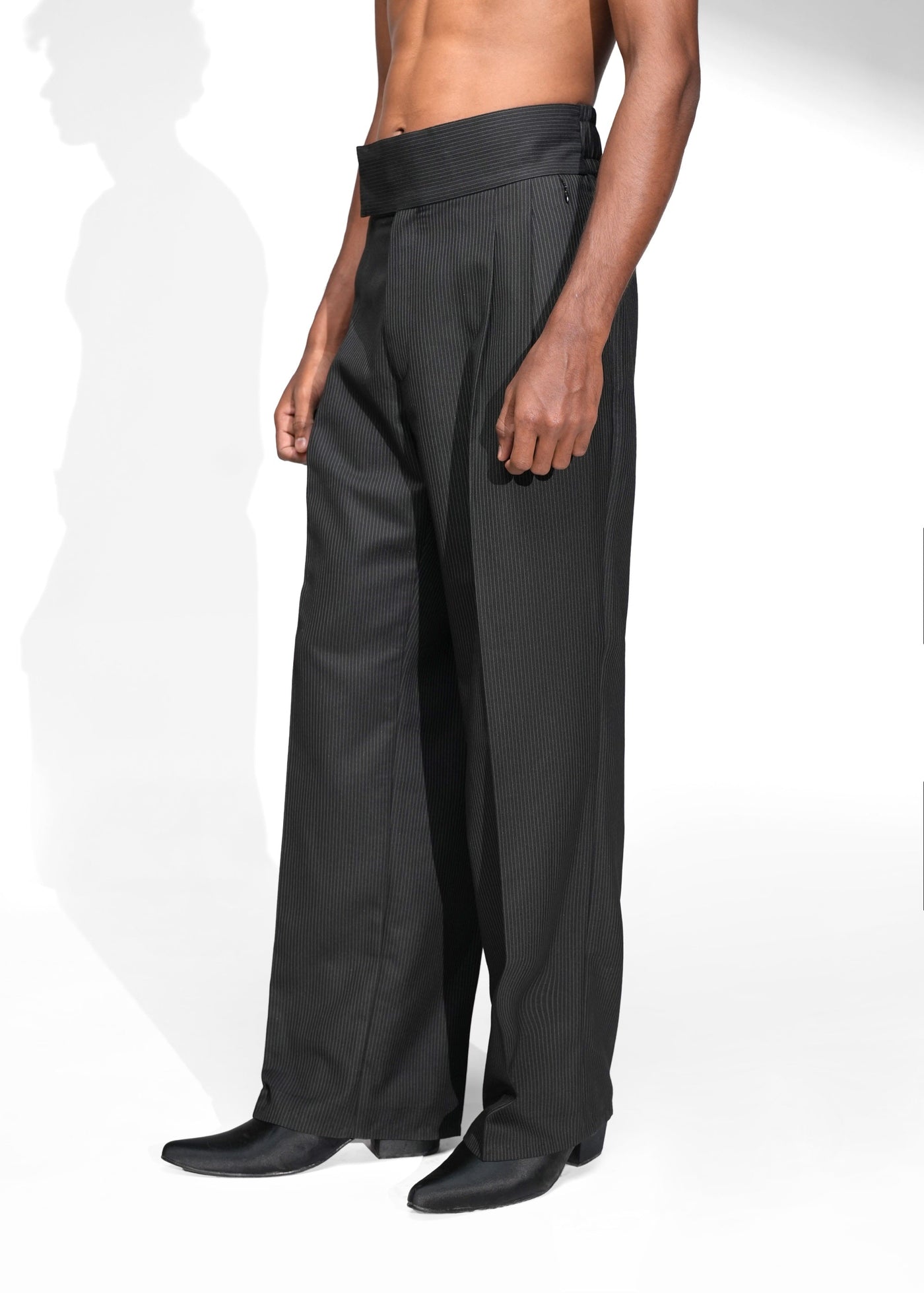 ROSANI The Pulse trouser in black - high waistband pleated trousers, front side view