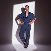 ROSANI The Alti shirt and The Aryom trouser from the DYMENSION collection. Navy co-ord with metallic ring embellishment. Full look, front view.