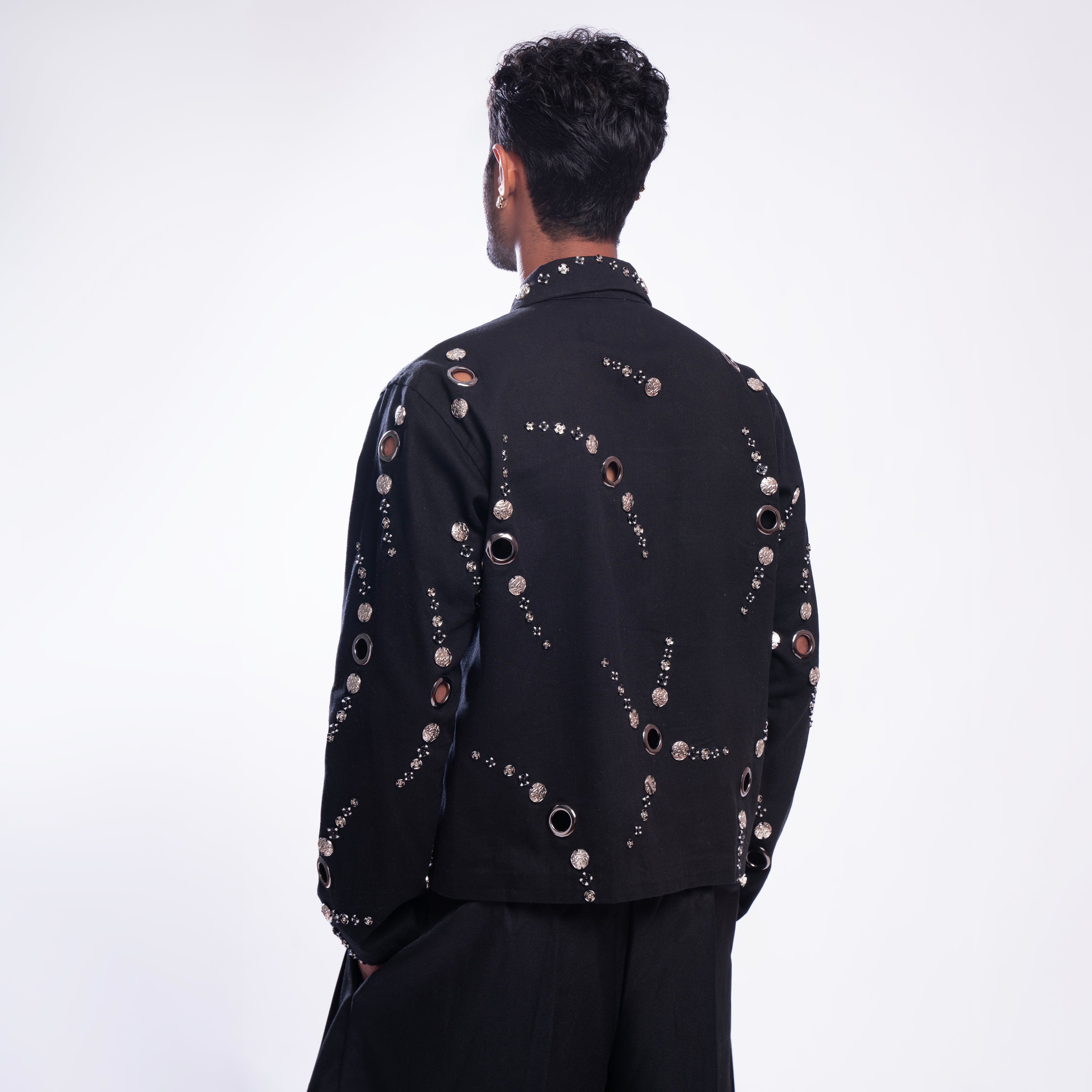 ROSANI The Arnos jacket in black, back view. Relaxed silhouette. DYMENSION collection.
