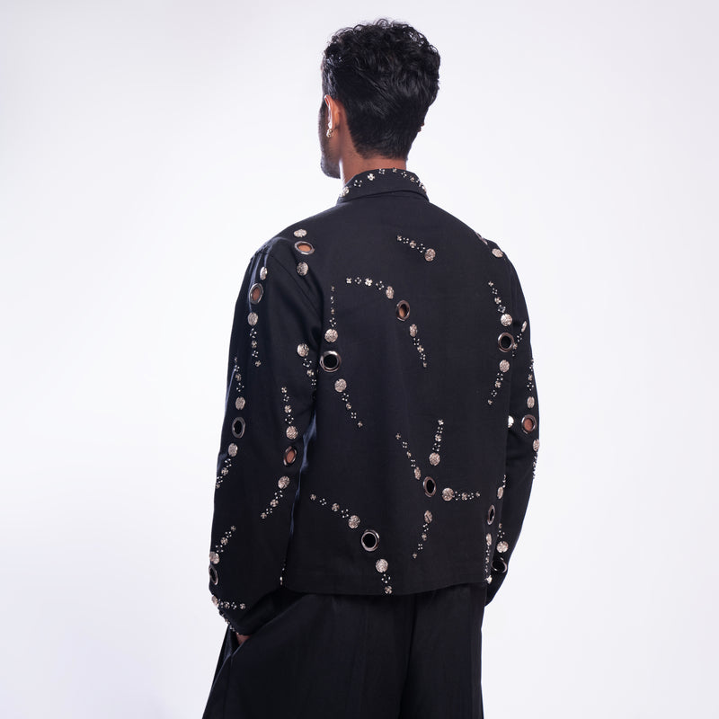 ROSANI The Arnos jacket in black, back view. Relaxed silhouette. DYMENSION collection.