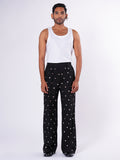 ROSANI The Blythe trouser in black. Full-front view showing wide-leg silhouette.