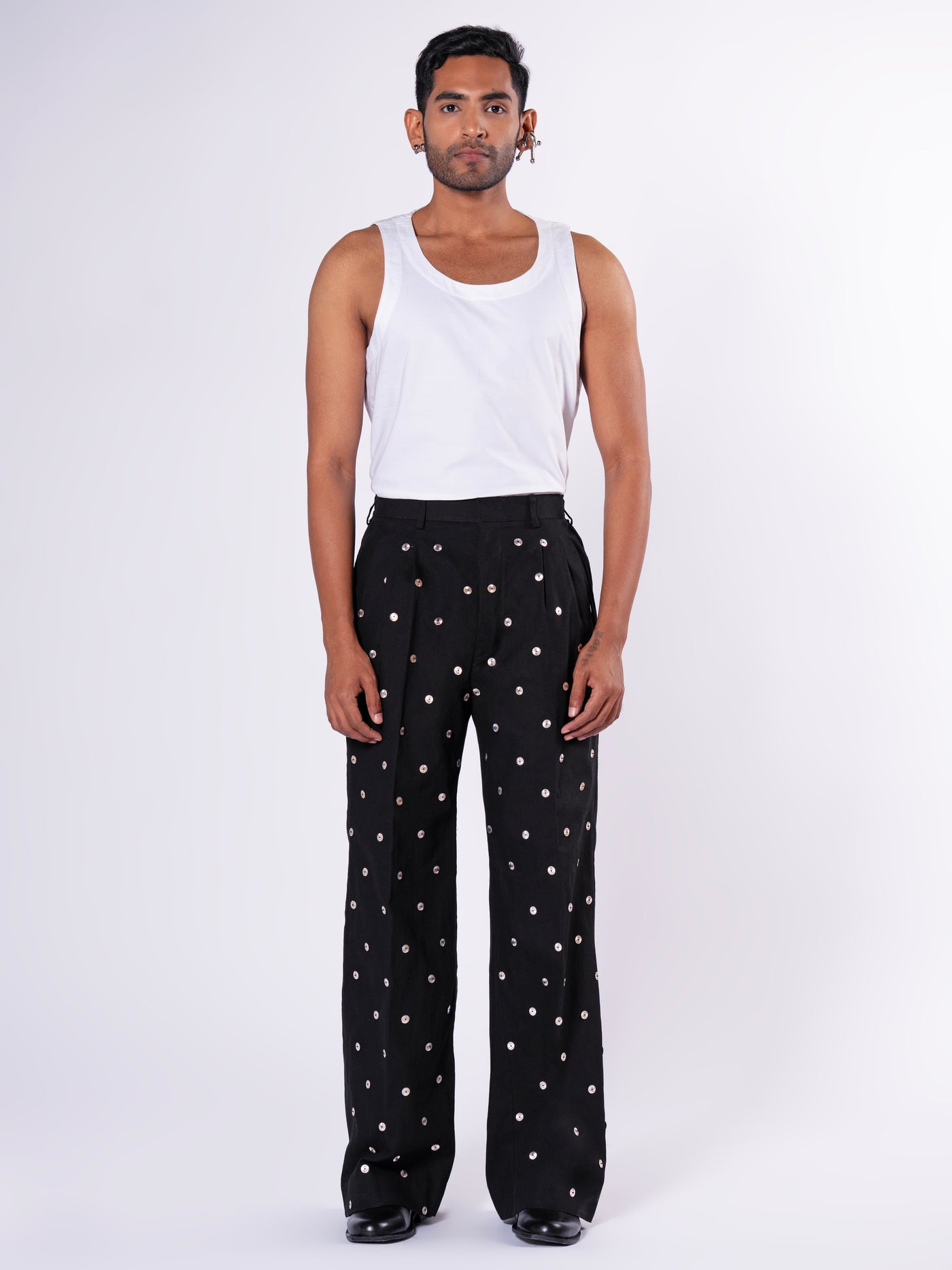 ROSANI The Blythe trouser in black. Full-front view showing wide-leg silhouette.