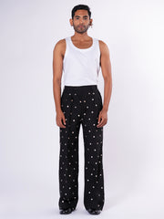ROSANI The Blythe trouser in black. Full-front view showing wide-leg silhouette.