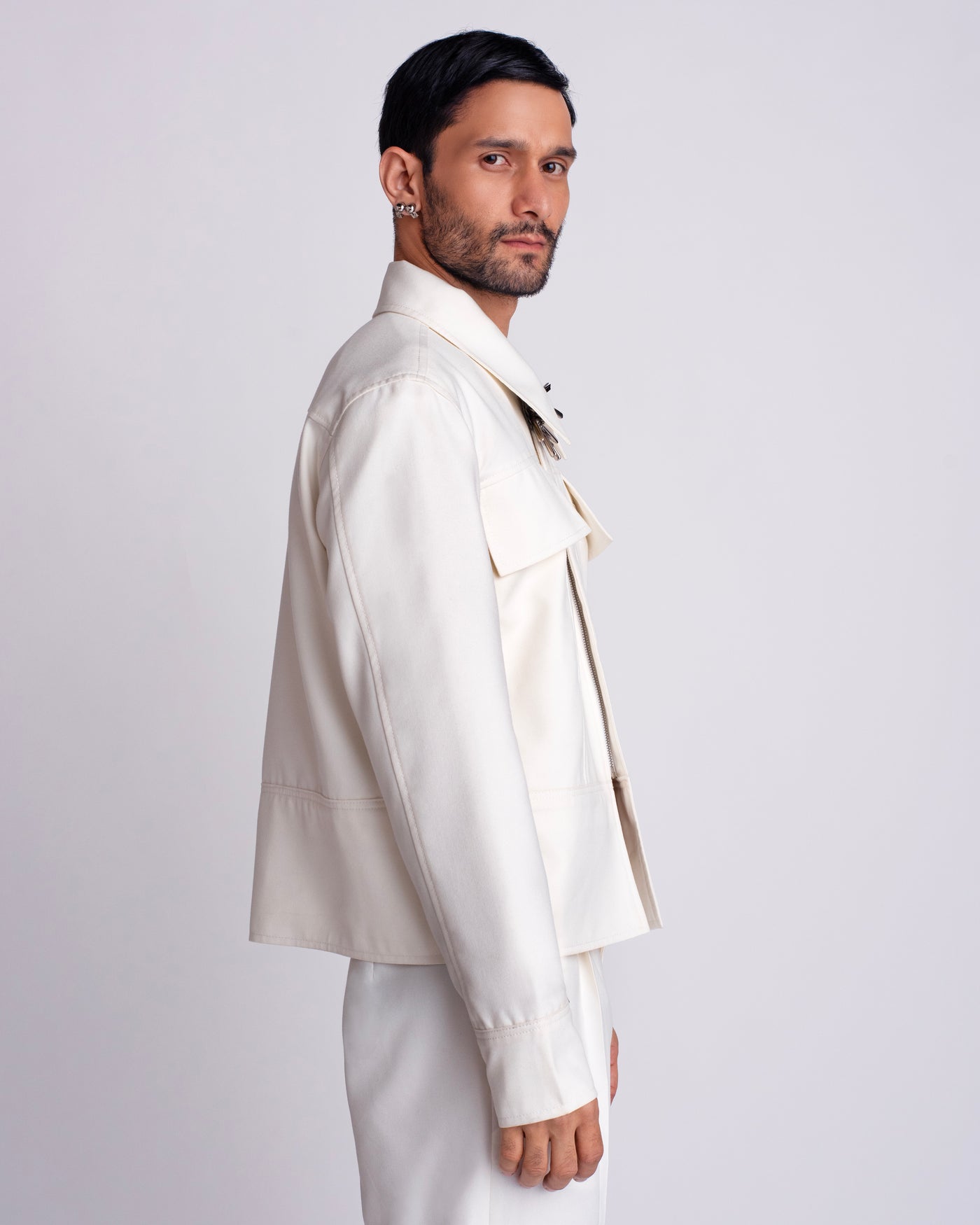 ROSANI The Charlie jacket in white. Side view showing relaxed silhouette.