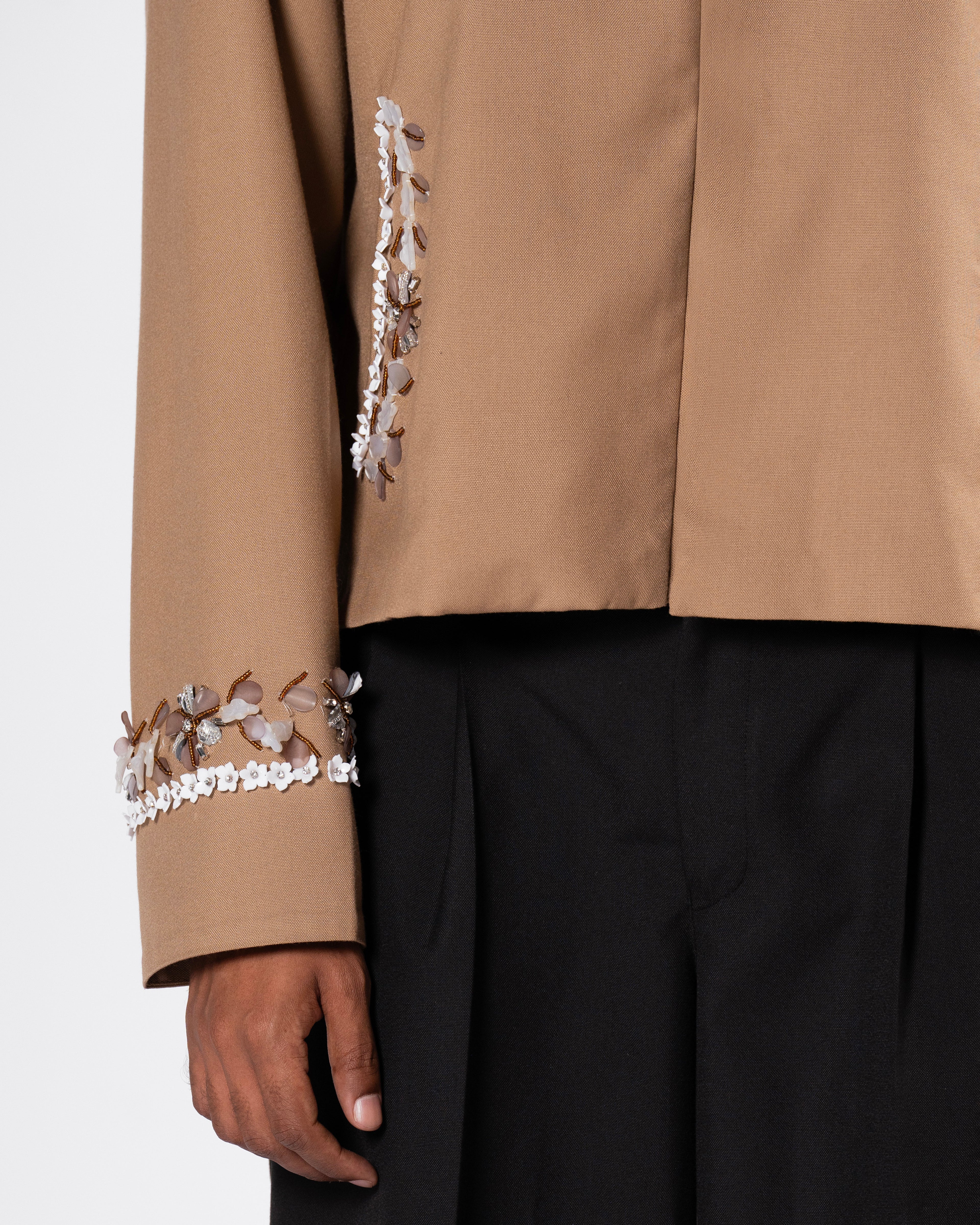 ROSANI The Darby jacket in khaki. Second detail view of floral surface coverage.